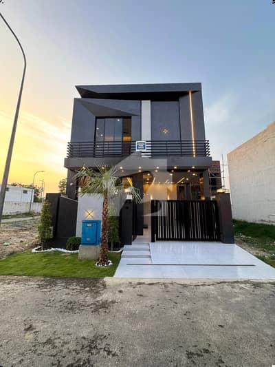 A beautifully designed and impeccably maintained 5 Marla luxury house is available in a prime DHA location, offering the perfect blend of elegance, comfort, and modern living.