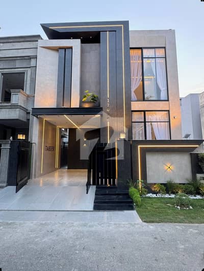 A Beautifully Designed And Impeccably Maintained 5 Marla Luxury House Is Available In A Prime DHA Location, Offering The Perfect Blend Of Elegance, Comfort, And Modern Living.