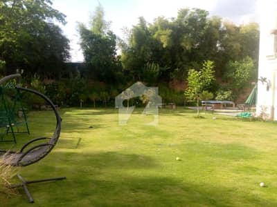 F7 -Plot Size Is 666 Sq Yds With 1200 Sq Yds Of Additional Landscaped And Fenced Lawn, With Pines, Water Fall, Bonfire And BBQ Area.