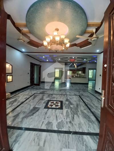 1.5 kanal beautiful house available for rent with big green lown in Banigala Islamabad