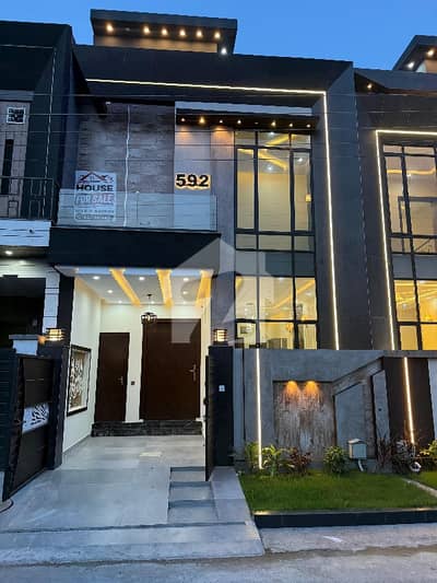 3 Marla double story house fr sale brand new home ideal and hot loction carpet road water electricity available 3D ultra model design Spanish look furnished home with wood work gated society 24 hour security guard near sozo water park near canal road facing park house like a dream house luxury house