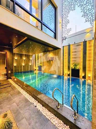 ULTRA LUXURY TOP-NOTCH BRAND NEW 1 KANAL HOUSE WITH GARDEN | PRIME LOCATION NEAR RAYA FAIRWAYS & PARK | FULL BASEMENT | POOL | CINEMA | DHA PHASE 7 | 100% ORIGINAL DEAL