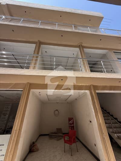 Unit for sale in Adiala road 2 shops one flat almost on Main adyla road