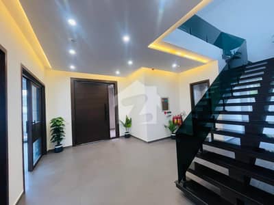 Brand New One Kanal Spanish House Phase 6 Hot Location Near Mosque Main Road DHA Lahore .