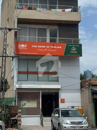 HIGH-YIELD 8 MARLA 7-FLOORS BUILDING FOR SALE ON AIRPORT ROAD WITH LIFT INSTALLED