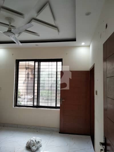LIKE BRAND NEW TILE FLOORING GATED COMMUNITY 5 MARLA LUSH HOUSE AVAILABLE FOR RENT FOR SMART FAMILY