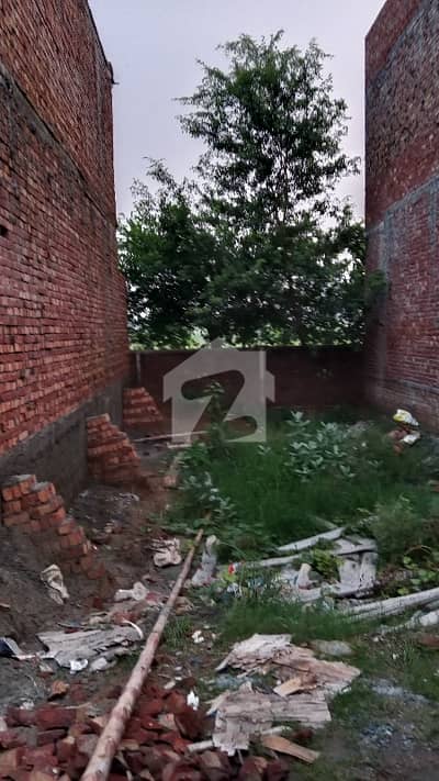 Good location near park sarounded house, security gated community 4marla plot.