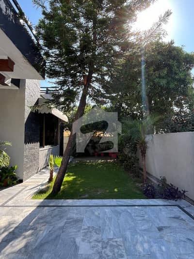 Beautiful 1 Kanal Furnished 5-Bedroom Single Unit House for Rent