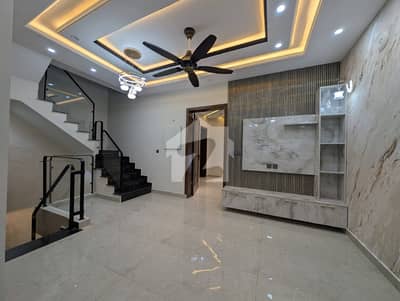 5-Marla Triple Story Brand New Beautiful Location House For Sale.