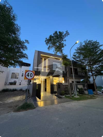 A beautifully designed and impeccably maintained 5 Marla luxury house is available in a prime DHA location, offering the perfect blend of elegance, comfort, and modern living.