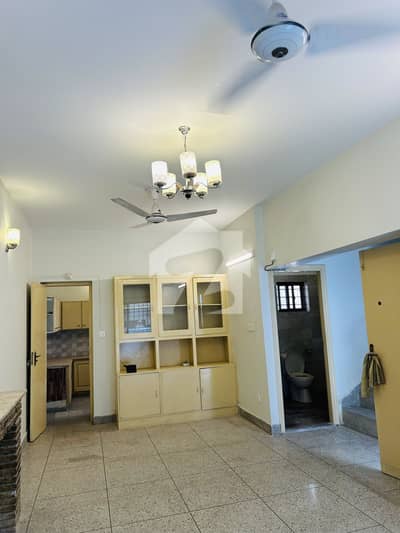 F-10 Triple Storey House For Sale Basement Hall Ground Floor Drawing Room Dining Kitchen & Bath First Floor 2Bedrooms With One Bath