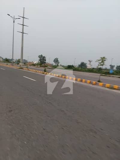 Near Park Plot No- 1475 Nearby Block C - 1 Kanal Plot On Top Location Of Phase 9 Prism DHA Lahore For Urgent Sale