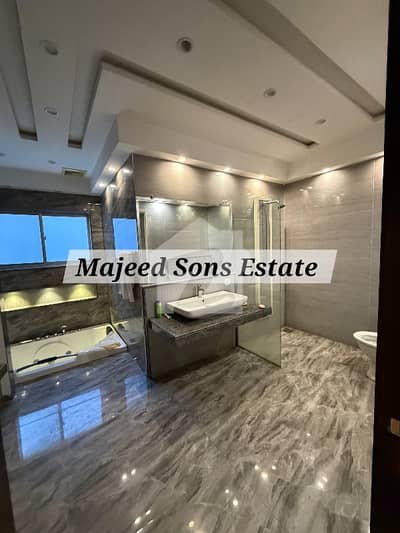 1 kanal Tile Floor luxury fully furnish lower portion is for rent in wapda town