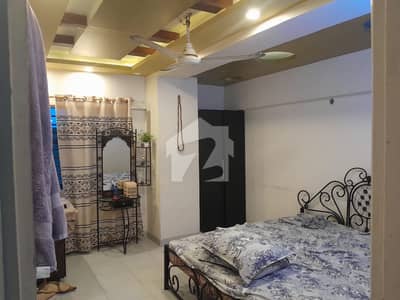 Well Furnished 3 Bed DD (5 Rooms) West Open Leased Corner Apartment On 1450 Sq Fts On 1st Floor In GREY NOOR TOWERS Scheme 33. Bank Loan Applicable.