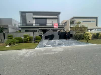SYED BROTHERS PROUDLY OFFERS: 1-Kanal Elegant Modern Bungalow Is Available In The Best Block Of DHA Lahore.