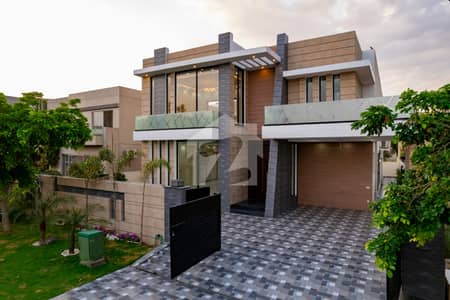 SYED BROTHERS PROUDLY OFFERS: 1-Kanal Elegant Modern Bungalow Is Available In The Best Block Of DHA Lahore.