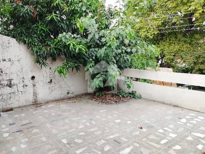 Main Double Road Building In Faisal Town - Block C Sized 1 Kanal Is Available