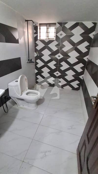 1 Kanal Tile-Floored Lower Portion Available for Rent in WAPDA Town Phase 1, Start Block