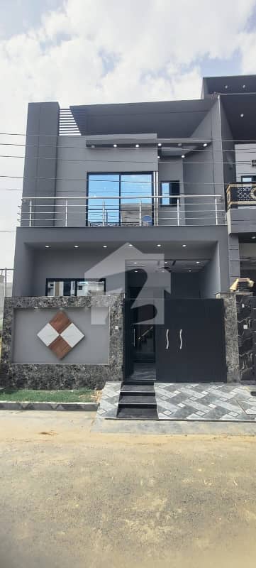 3 Marla double story house fr sale brand new home ideal and hot loction carpet road water electricity available 3D ultra model design Spanish look furnished home with wood work gated society 24 hour security guard near sozo water park near canal road luxury house like a dream house
