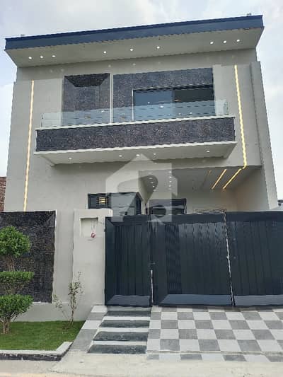 4 Marla double story house fr sale brand new home ideal and hot loction carpet road water electricity available 3D ultra model design Spanish look furnished home with wood work gated society 24 hour security guard near sozo water park near canal road luxury house like a dream house