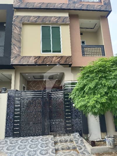 3 Marla double story house fr sale brand new home ideal and hot loction carpet road water electricity available 3D ultra model design Spanish look furnished home with wood work gated society 24 hour security guard near sozo water park near canal road luxury house like a dream house