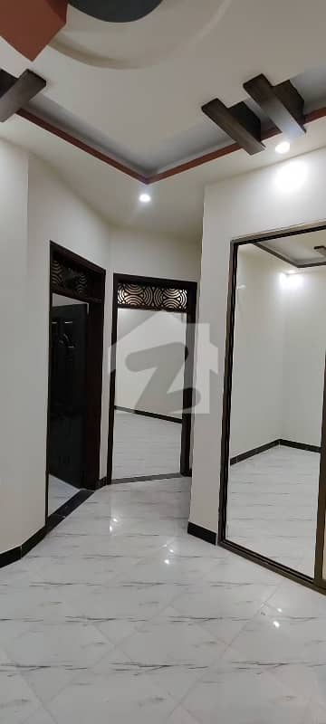 800 Yard Top Class Location Bungalow Neat And Clean With 2 Kitchen Garden Parking LOCATED In Kda Officers Society National Stadium AOHS DOHS