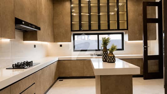 Exclusive Luxury Living in DHA Phase 7 1-Kanal Brand New Modern Design House For Sale | 5 Bedrooms with Attached Bathrooms, 2 TV Lounges, Drawing Dining, Double Kitchens, Store & Servant Quarter | Peaceful & Secure Environment | Wall Green Realtors