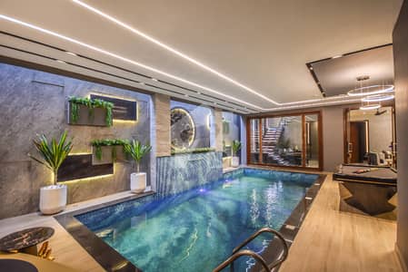 1 Kanal Designer House With Home Theater Swimming Pool Located In Sector F Ph-5 DHA Lhr 1 Kanal Designer House With Home Theater Swimming Pool Located In Sector F Ph-5 DHA Lhr
