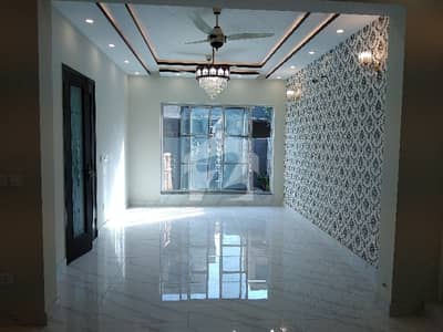 5 Marla House In Central DHA 9 Town For Sale