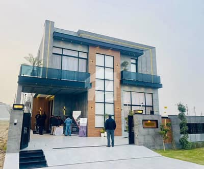 TWO KANAL BEAUTIFULL HOUSE WITH ONE KANAL LAWN AVAILABLE FOR RENT IN DHA PHASE 7