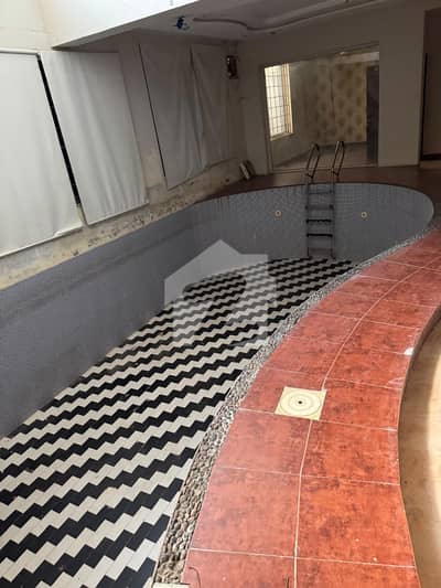 Triple Storey Designer House With Luscious Lawn And Swimming Pool On Reasonable Rent