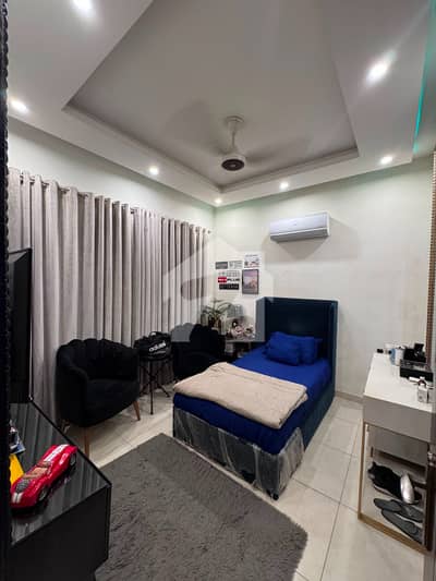 Fully Furnished Luxury 100 Sq. Yards Bungalow for Sale in a Prime Location of DHA Phase 8, Karachi.