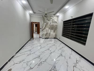 Prime 7 Marla Corner House for Sale in G-11, Islamabad! Bedrooms: 4 Spacious Bedrooms with Attached Bathrooms Living Spaces: 2 Drawing & Dining Areas + 2 TV Lounges Kitchens: 2 Kitchens Outdoor & Extra Space: Beautiful Attached Garden,