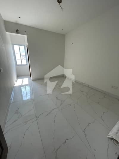 luxurious 2 bed dd available on main shaheed e millat road with all modern amenities lift generator play area masjid gym etc