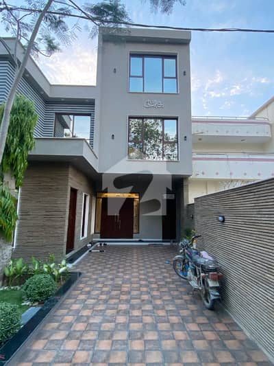 200 Square Yards 100 Square Yards Extra Land  Beautiful House Main 150 Feet Road Facing Fully Renovated 5 Bedrooms Drawing 2 Lounges Kitchen Green Lawn