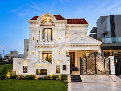 10 Marla Classic Design Mansion for Sale | DHA Phase 7 Lahore    4 Master Bedrooms  Fully Furnished  Stunning Galleria Design  Elegant Drawing & Dining  Spacious Lounge  Servant Quarter in Basement  Near Park & Commercial Market  Excellent Main