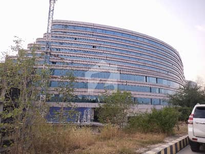 For Rent Commercial First Floor of 925 SQ ft Near Attock Fuel Pump Sector D DHA Phase 2 Islamabad .