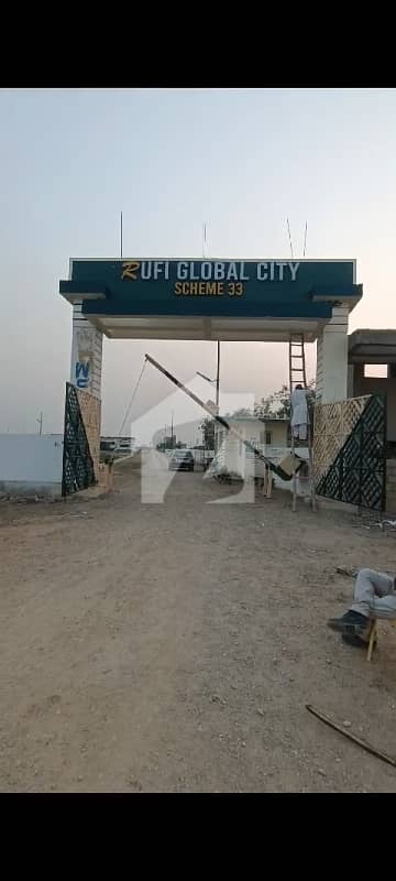 120 yards leased plot rufi Global city scheme 33 near gulshan e Usman