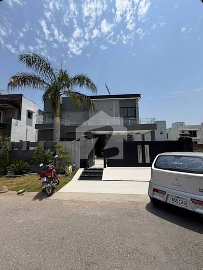 1 KANAL ELEGANT & FULLY MAINTAINED SUPER HOT LOCATED BUNGALOW NEAR TO DOLMEN MALL IS AVAILABLE IN DHA, LAHORE | 7 ACs INSTALLED