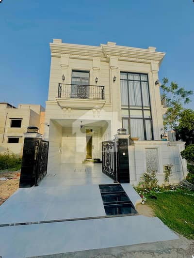 A beautifully designed and impeccably maintained 5 Marla luxury house is available in a prime DHA location, offering the perfect blend of elegance, comfort, and modern living.