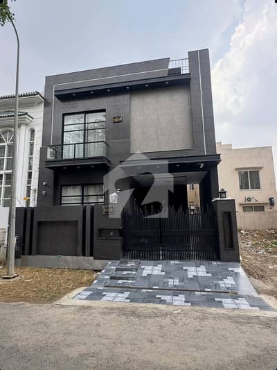A beautifully designed and impeccably maintained 10 Marla luxury house is available in a prime DHA location, offering the perfect blend of elegance, comfort, and modern living.
