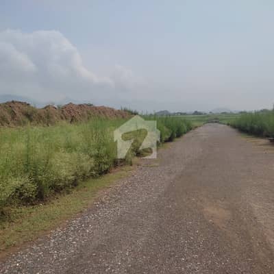 PLOT MAIN DOUBLE ROAD CORNER AT INVESTOR PRICE