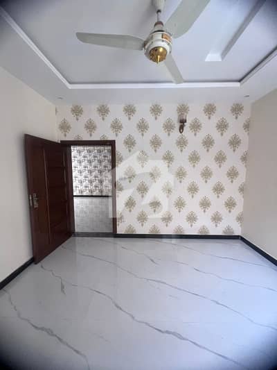 Tile flooring main boulevard Triple story House Available For Sale in CBR Town