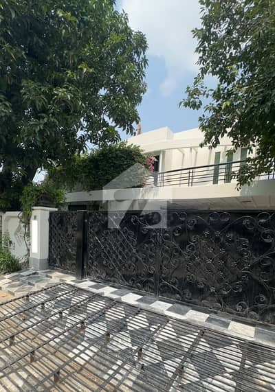 One Kanal Used Modern Design Double Unit Bungalow For Sale At Prime Location Of DHA Lahore Near To Park Masjid & Commercial Market. One Kanal Used Modern Design Double Unit Bungalow For Sale At Prime Location Of DHA Lahore Near To Park Masjid & Commercial Market.