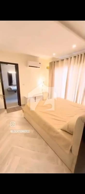 It'S A Luxury Furnished Apartment With A Very High R O I. It Is Located In The Heart Of Bahria Town Near Grand Mosque And Cakes And Bakes Bakery.