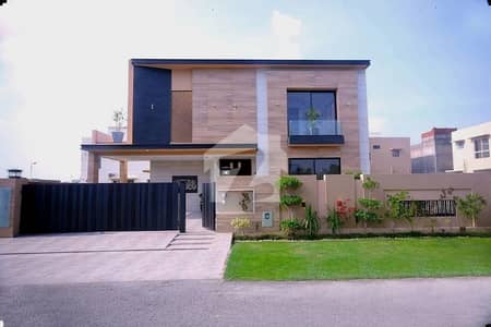 1 KANAL ELEGANT AND FULLY MAINTAINED SUPER HOT LOCATED BUNGALOW IS AVAILABLE IN THE BEST BLOCK OF DHA LAHORE.