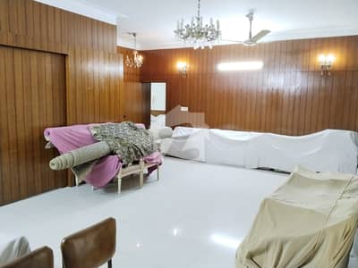 2 Kanal Double-Story Used House for Sale on 60 FT Road in M Block, Model Town, Lahore