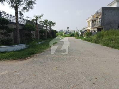 E18 Health Enclave Islamabad Residential plot surrounded by houses
