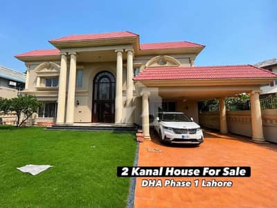2 Kanal Slightly Used Spanish Design Well Maintained 6-Bedroom Semi Basement Bungalow For Sale at Prime Location of DHA Lahore Near To Park Masjid & Commercial Market .