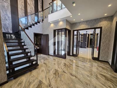 AC Insulted 1 Kanal Brand New Modern Design House For Rent In DHA Phase 5 Block-A Lahore.